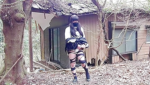 Brunette girl in stockings masturbates in the abandoned house