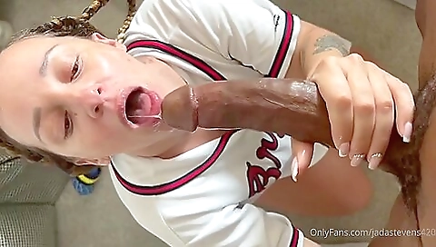 This ebony milf with a huge black dildo in her pussy