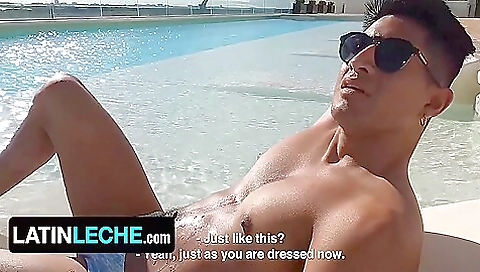 Busty brunette with a tattooed body rides a large cock