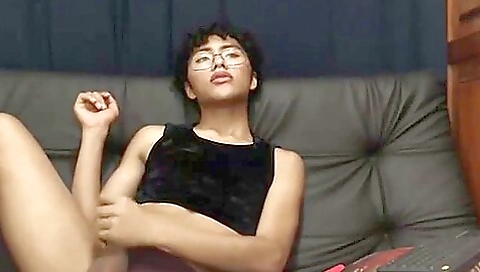 Fabulous amateur brunette in a black dress and jeans